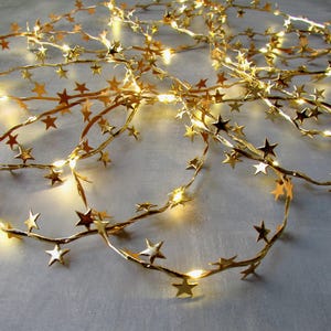 Mini Gold Stars Fairy lights. Starry string lights. Celestial home decor. Christmas decor lighting. Fantasy party table Christmas garland uk